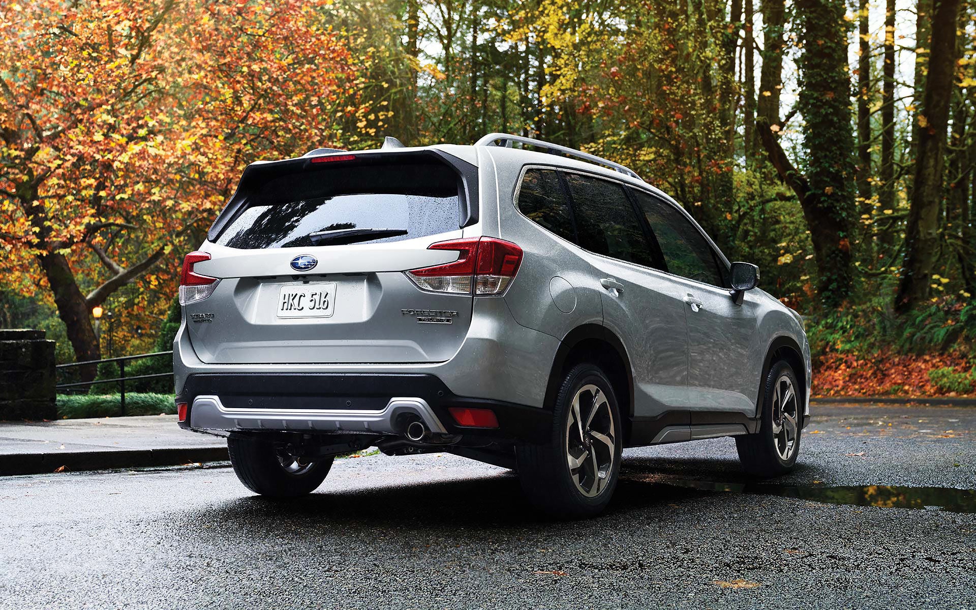 The rear of the 2022 Forester on a neighborhood street. | Subaru of Spartanburg in Spartanburg SC