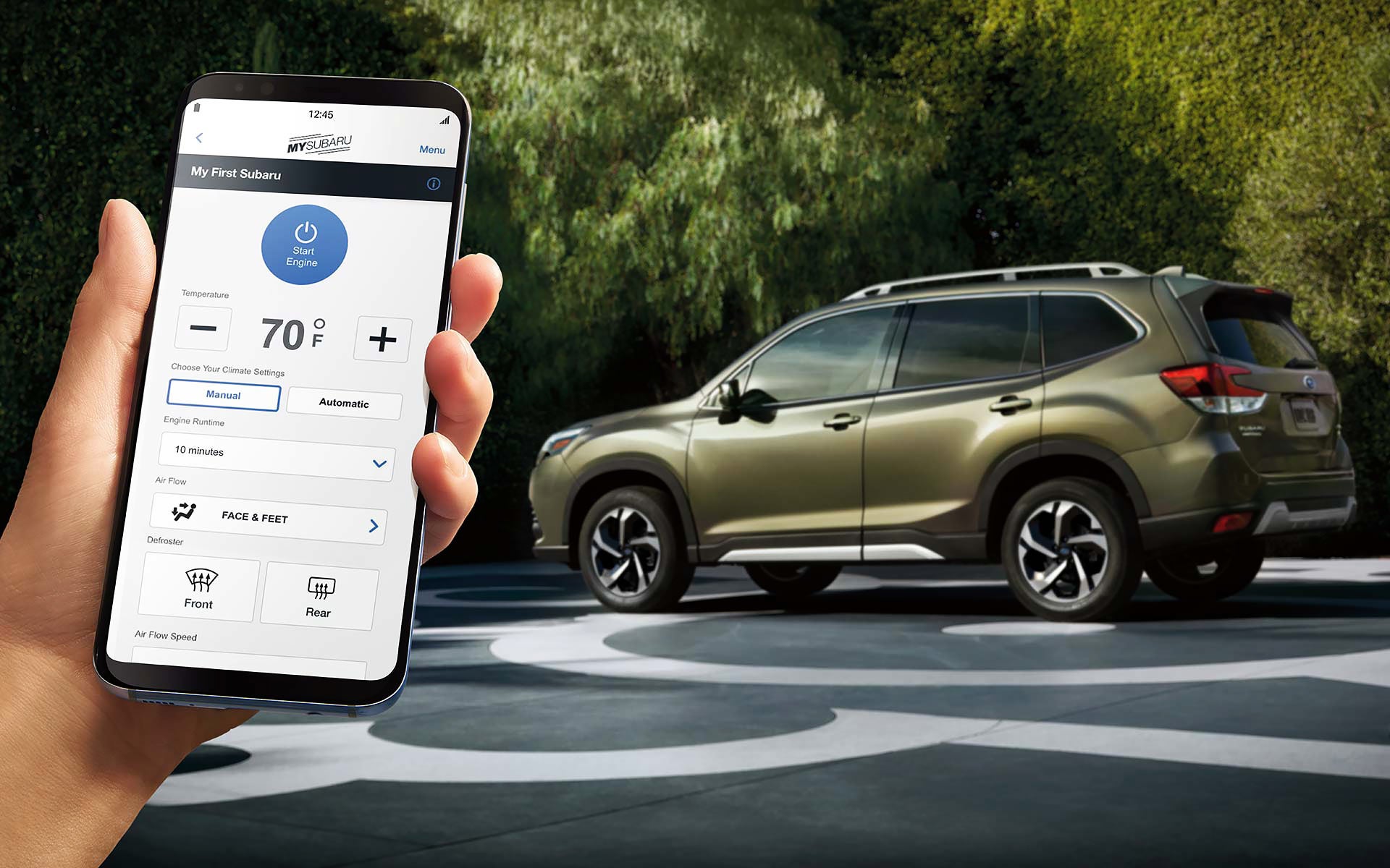 A close-up of a phone showing the Remote Engine Start with Climate Control feature of SUBARU STARLINK® Safety and Security available on the 2022 Forester. | Subaru of Spartanburg in Spartanburg SC