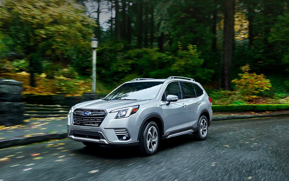 A 2022 Forester driving on a highway. | Subaru of Spartanburg in Spartanburg SC