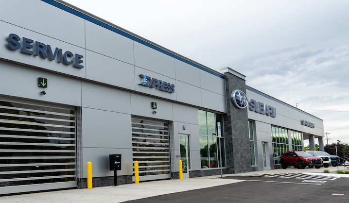 Technicians at work in Subaru service bays